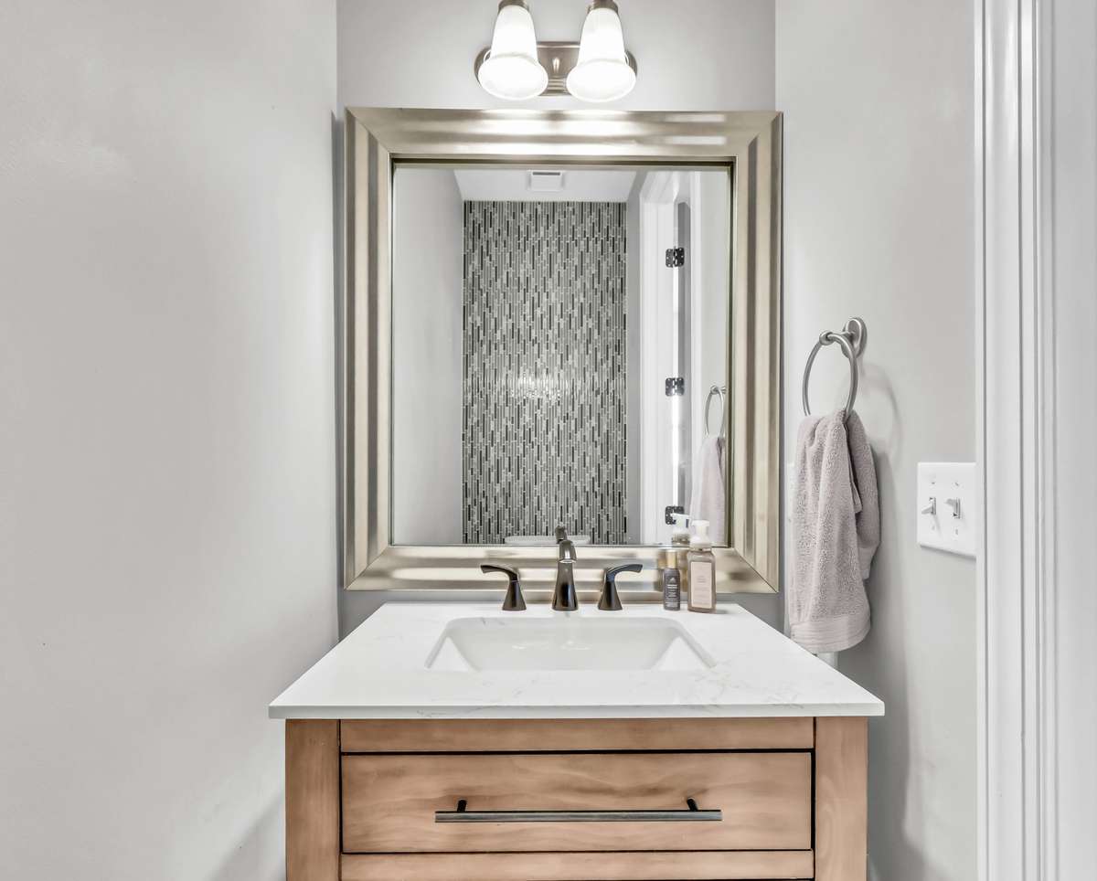 The powder room on the main floor has been beautifully updated.