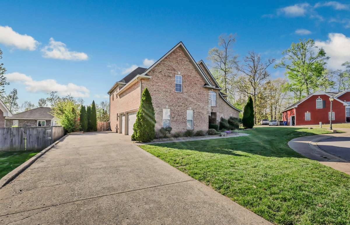 Located on a cul de sac with a nice, level lot & attached 3 car garage.