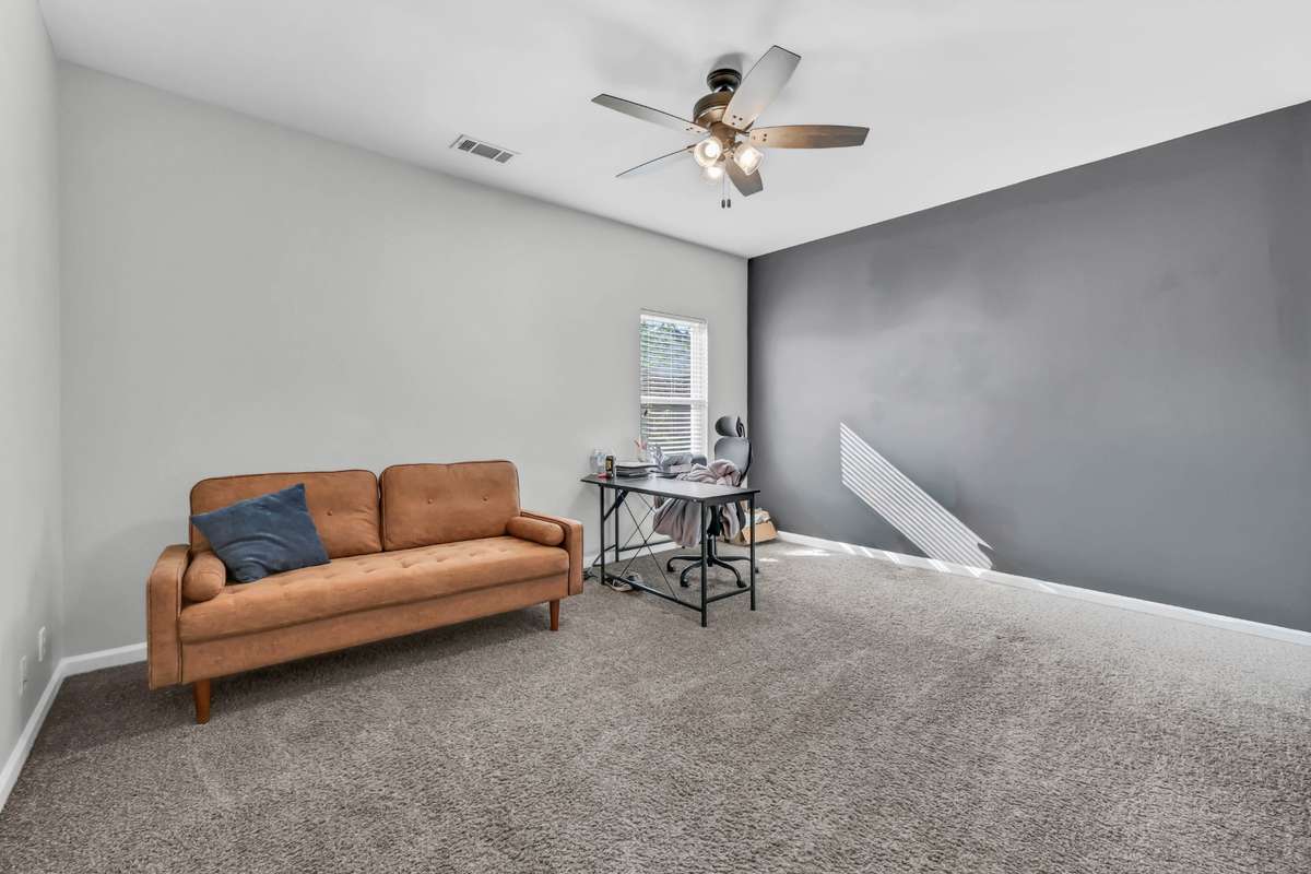 The 4th bedroom is located upstairs.