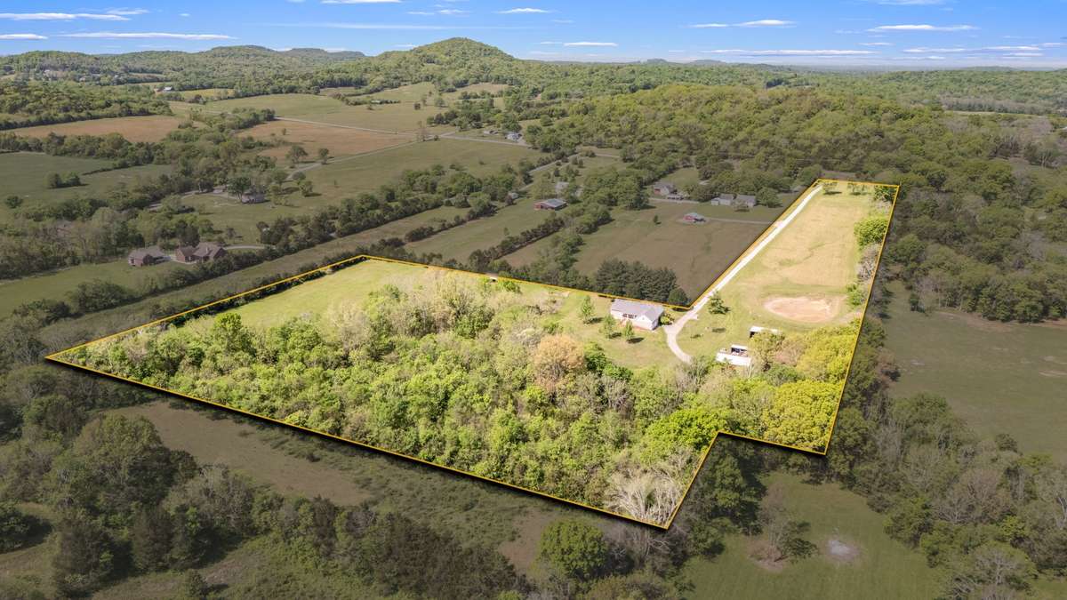 16.5± acres of Middle Tennessee beauty— fenced with a perfect blend of open pasture, mature trees, and peaceful privacy.