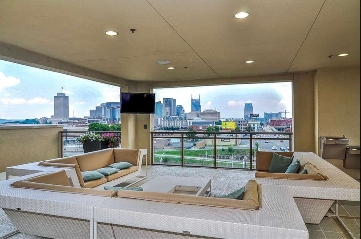 The fifth floor rooftop is also where you will find the lounging area complete with TV grill and bar area. Just look at that gorgeous view!! Imagine entertaining here!!
