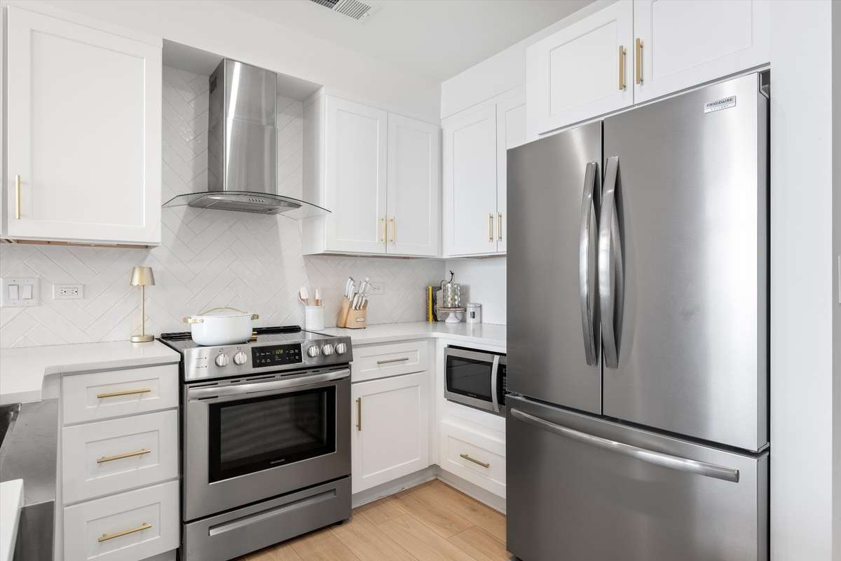 French door stainless refrigerator and built in microwave