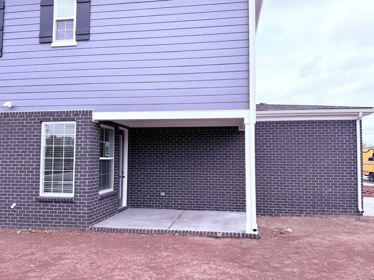 ***Picture taken on 4/1/26 to show the current status of construction***

Enjoy outdoor living on the covered rear patio, ideal for entertaining, dining al fresco, or simply relaxing in comfort and shade.