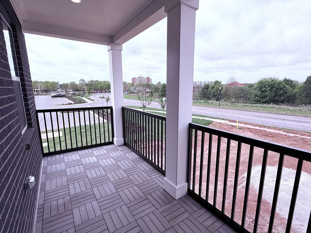 ***Picture taken on 4/1/26 to show the current status of construction***

From the second-floor loft, the covered balcony offers relaxing views, extending the living space outdoors for quiet moments or entertaining.