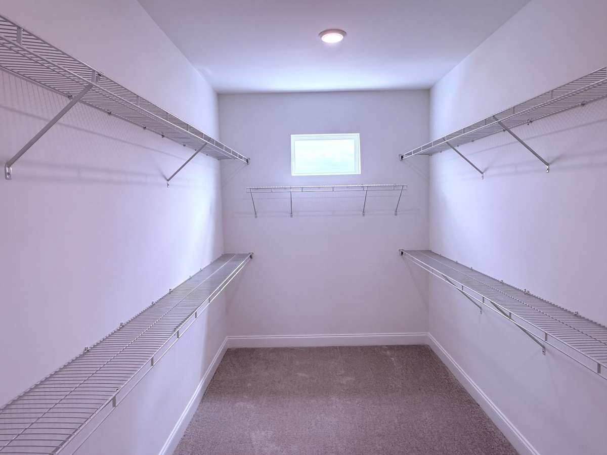 ***Picture taken on 4/1/26 to show the current status of construction***

At 14' x 7', the generous walk-in closet provides plenty of room to keep everything neatly organized.