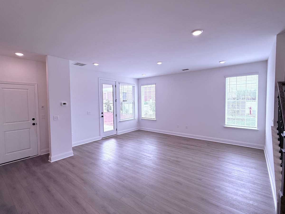 ***Picture taken on 4/1/26 to show the current status of construction***

Experience indoor/outdoor living with the great room opening directly to the covered rear patio, ideal for gatherings or quiet relaxation.