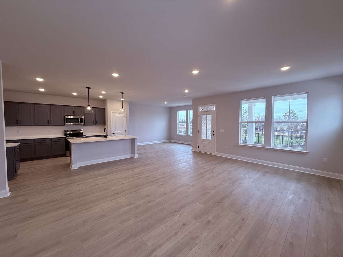 Luxury vinyl plank flooring flows throughout the entire 1st floor, combining the look of hardwood with durability and easy maintenance. This stylish flooring enhances the home’s aesthetic while providing a practical surface for everyday living.