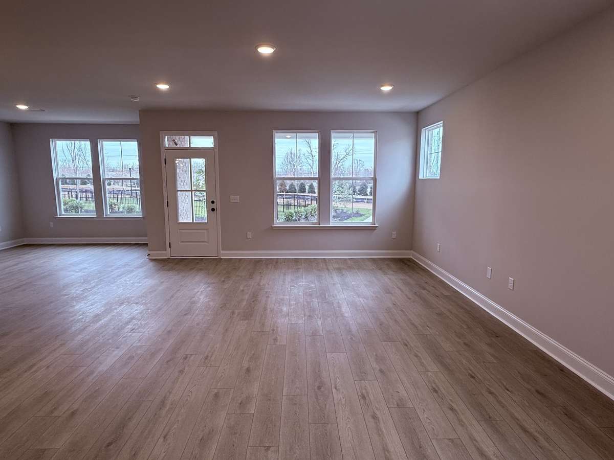 Whether you’re hosting friends, enjoying family movie nights, or simply relaxing, this open and airy great room space provides the perfect balance of comfort and style.