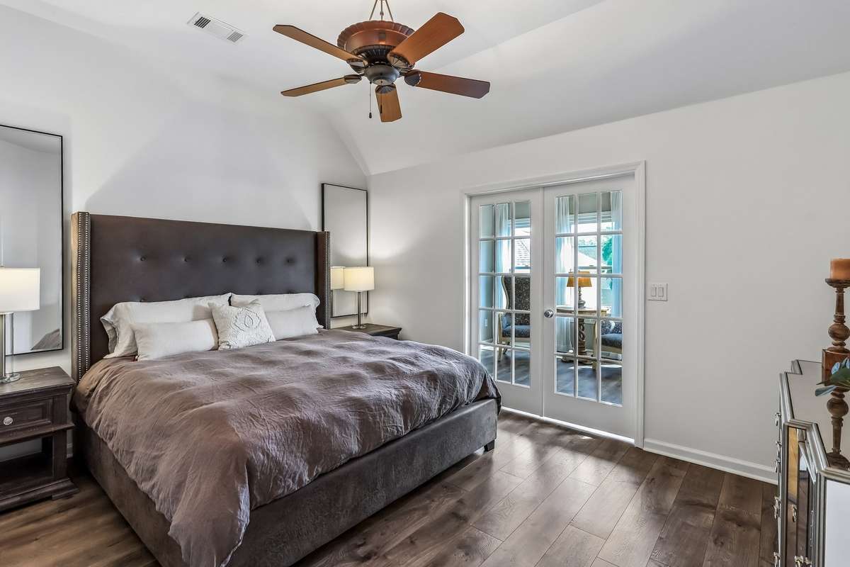 Primary bedroom on second floor with a private sitting room.