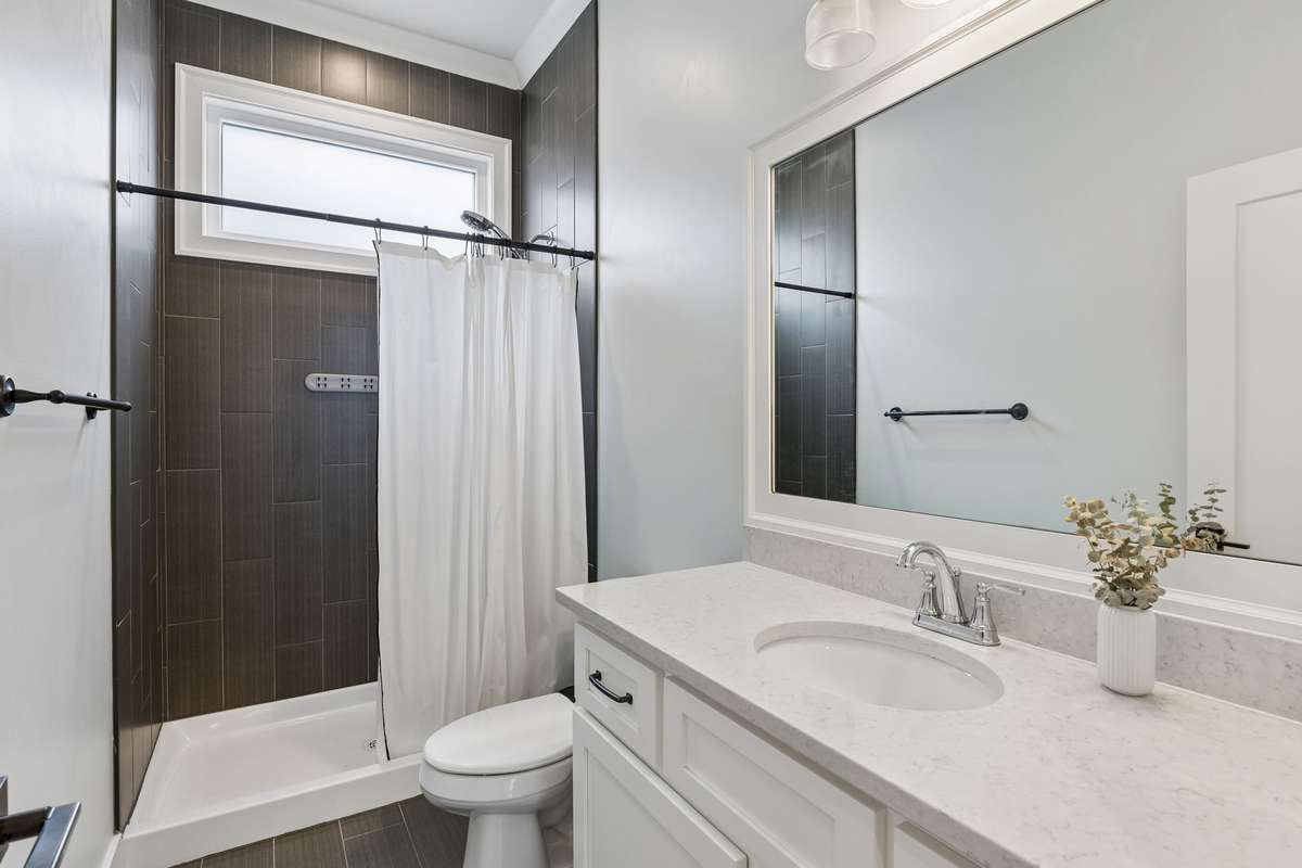 Full bath downstairs - Perfect for the guest downstairs bedroom to be a guest room or office