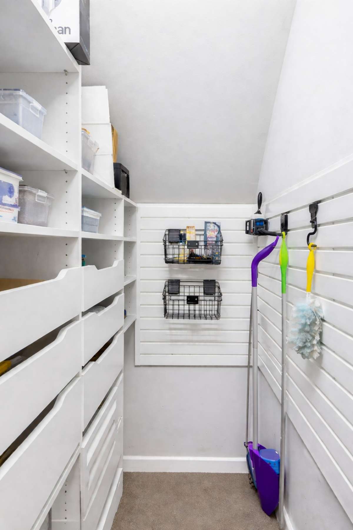 Custom hall way closet with plenty of storage and organization