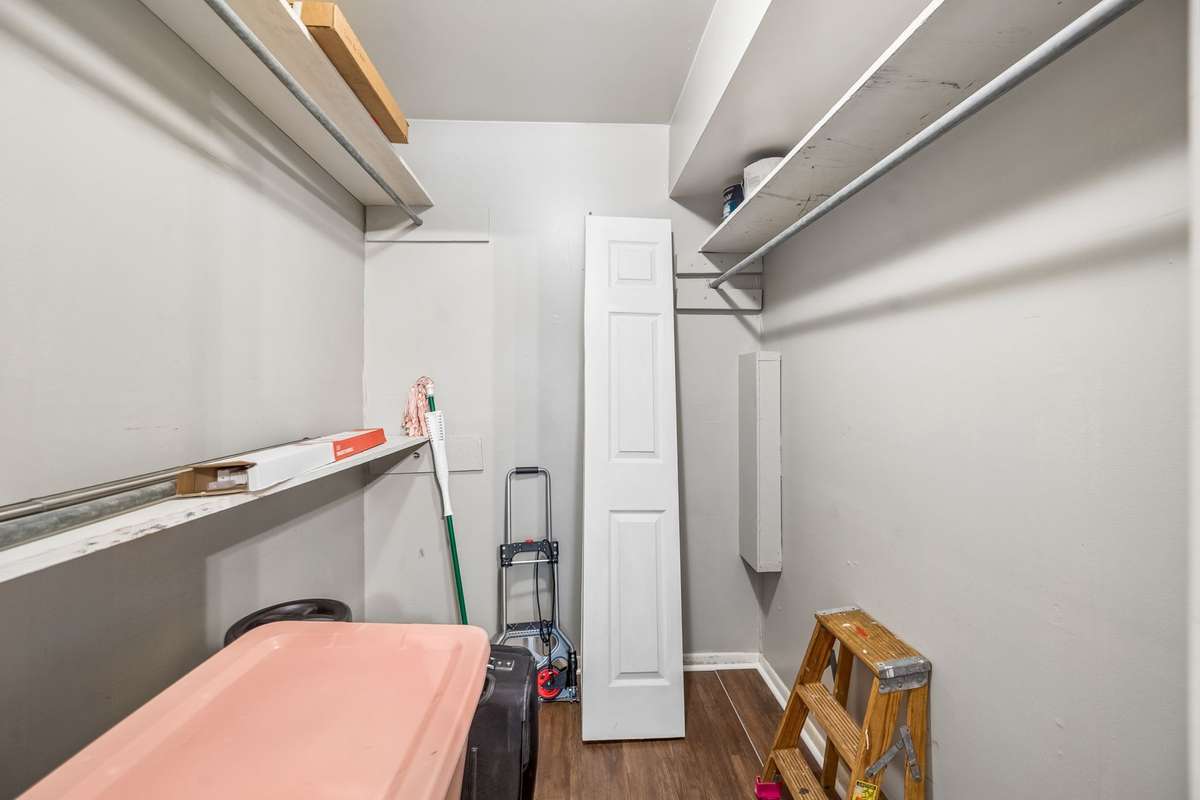 This super large walk-in closet is located in the primary bedroom suite.