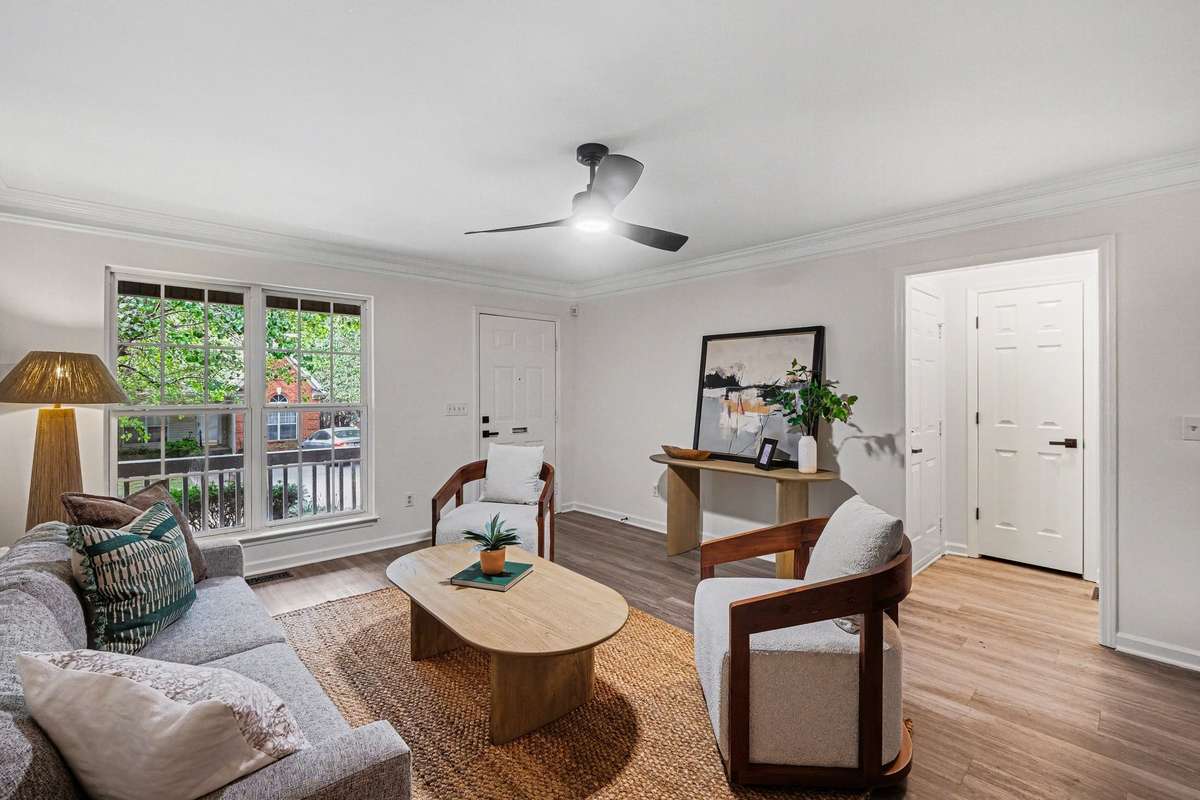 Every detail has been considered, including stylish new light fixtures and upgraded door handles that add a contemporary touch throughout the main level. The fresh interior paint and wide-plank flooring create a cohesive, designer feel.