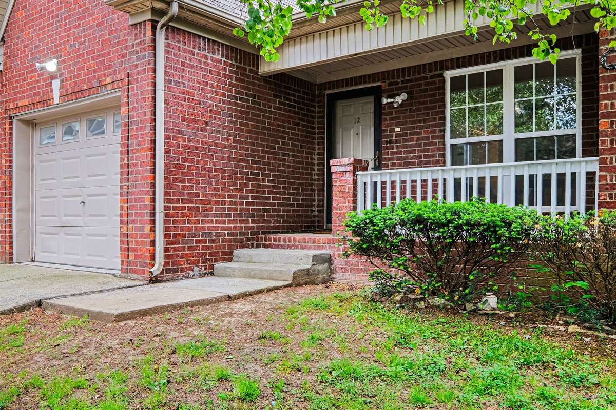 A charming brick exterior welcomes you to this beautifully updated townhome. Featuring a private covered entrance and the added convenience of an attached garage, this home offers both character and functionality in a prime Nashville location.