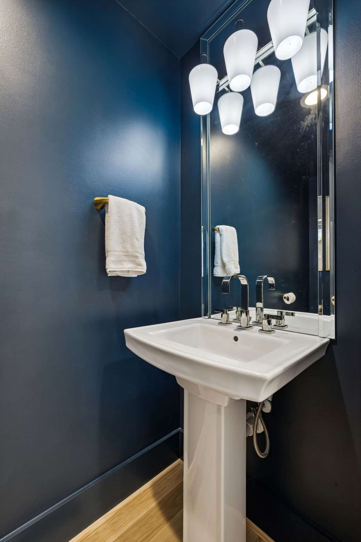 Convenient half bathroom located on main level