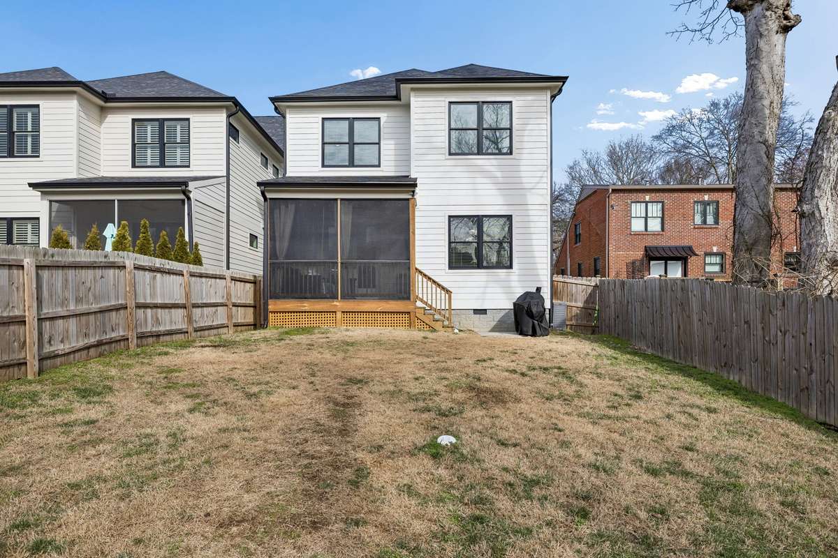 Fenced-in back yard with plenty of space to make it yours.