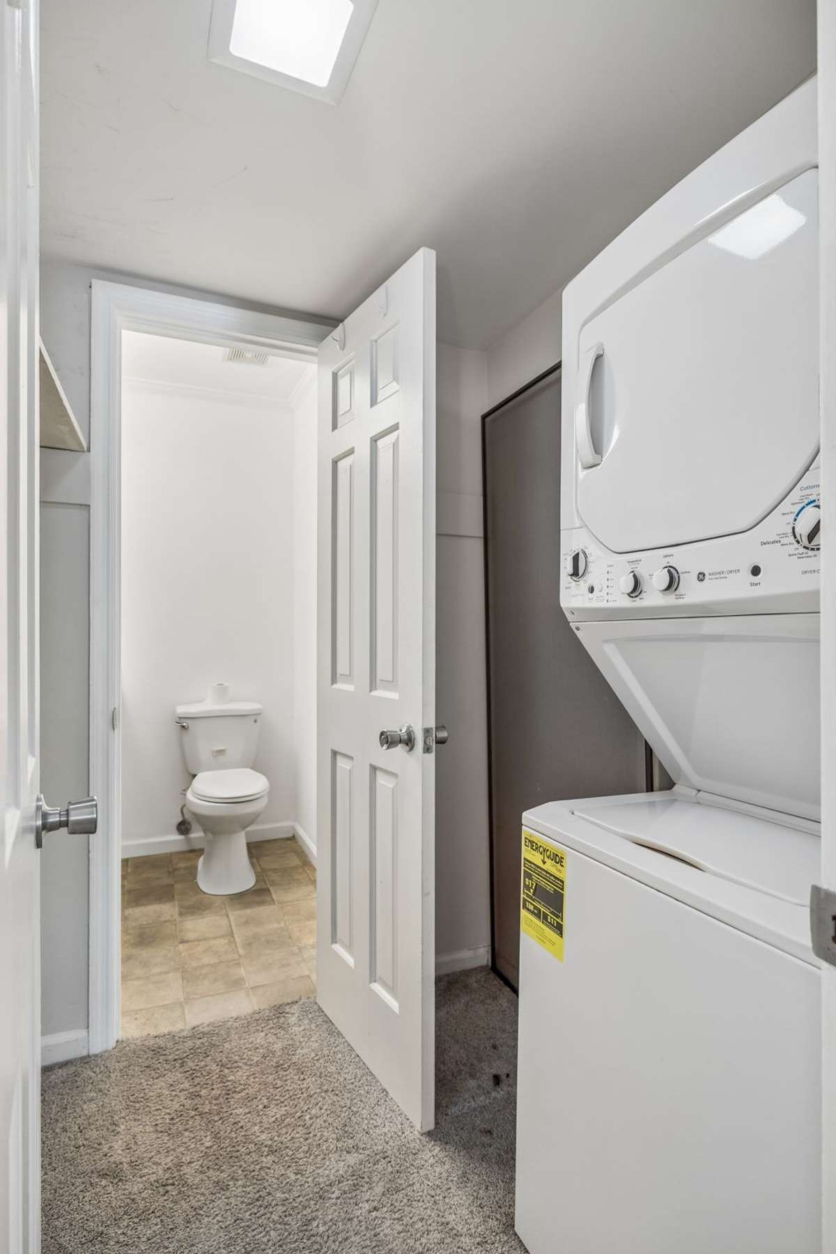 Spacious walk-in closet with stackable washer/dryer to convey.