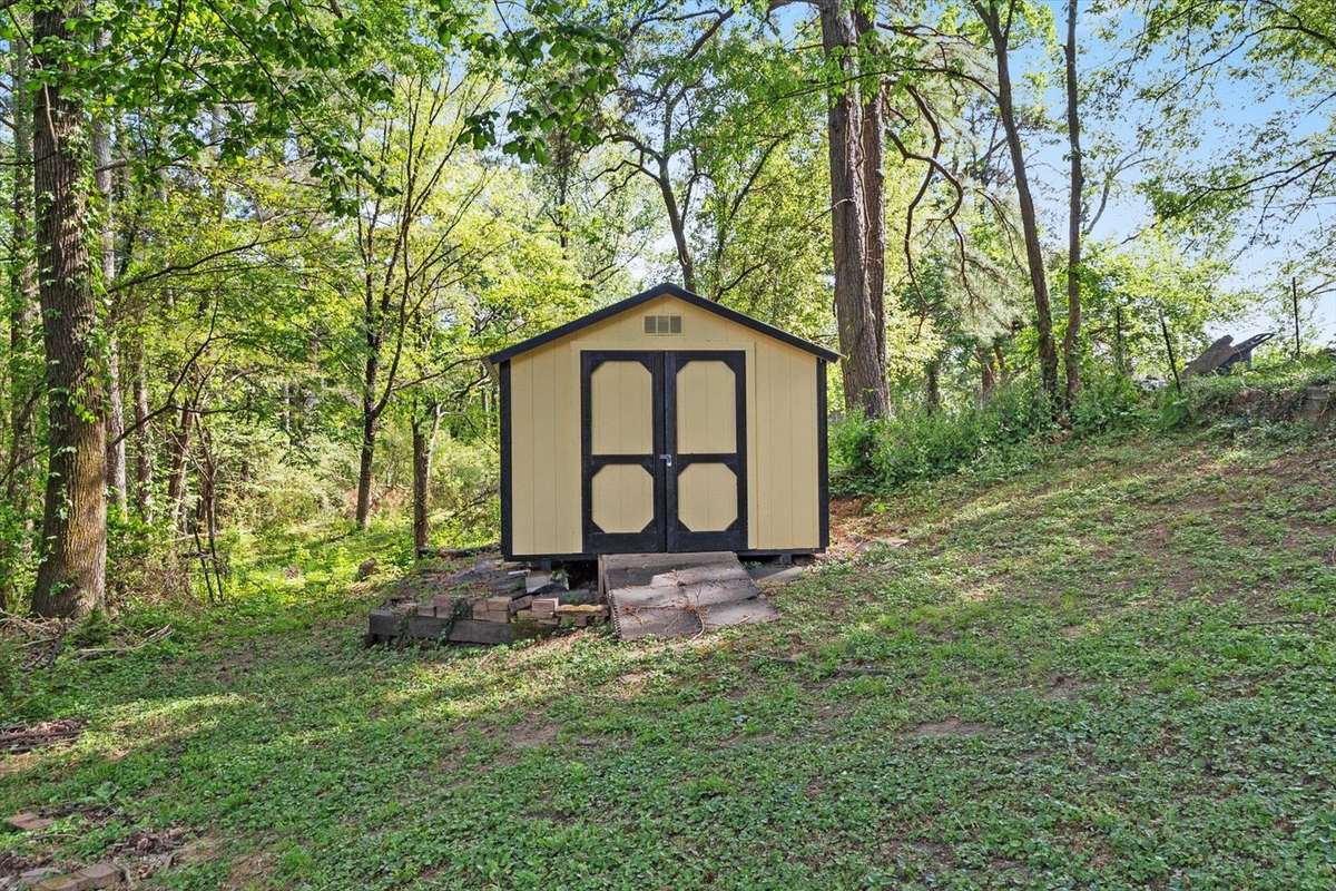 Storage Shed conveys. Recently repainted and roof replaced.