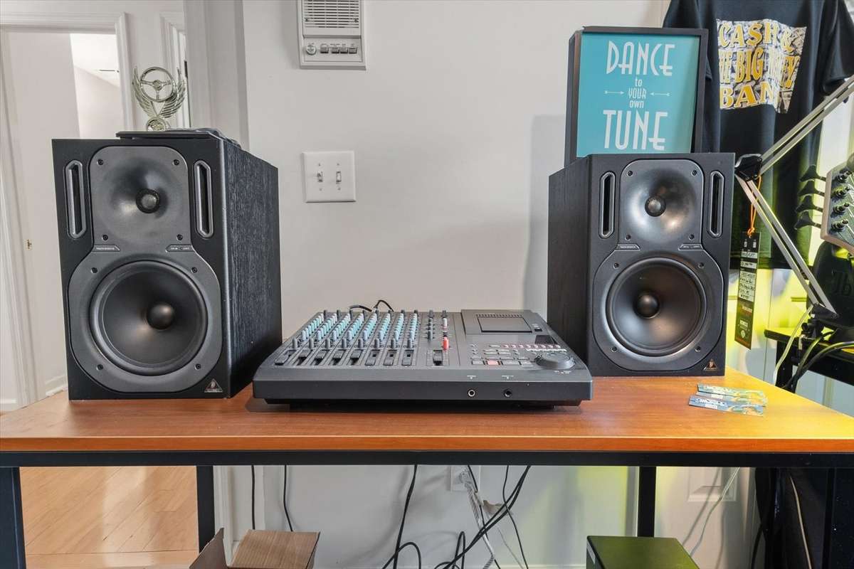 High quality studio monitor speakers and mixing board.