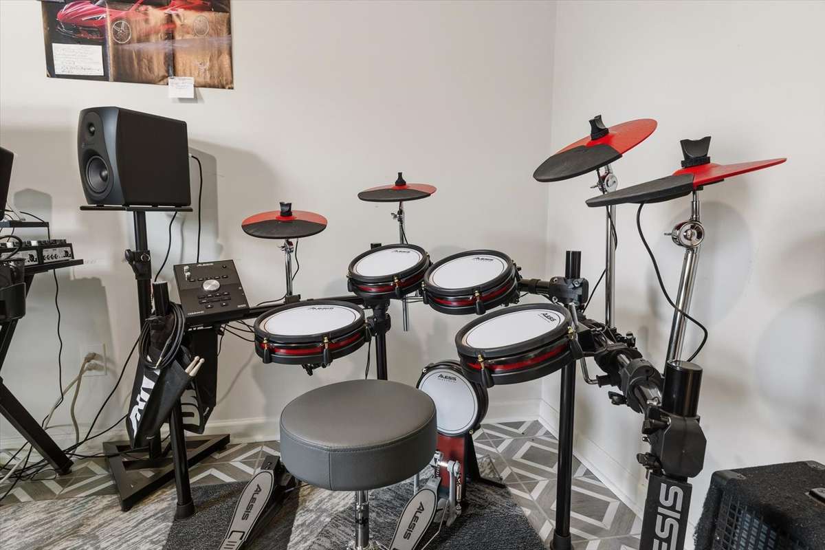 Alesis Electronic Drum Kit, willing to sell with studio package.
