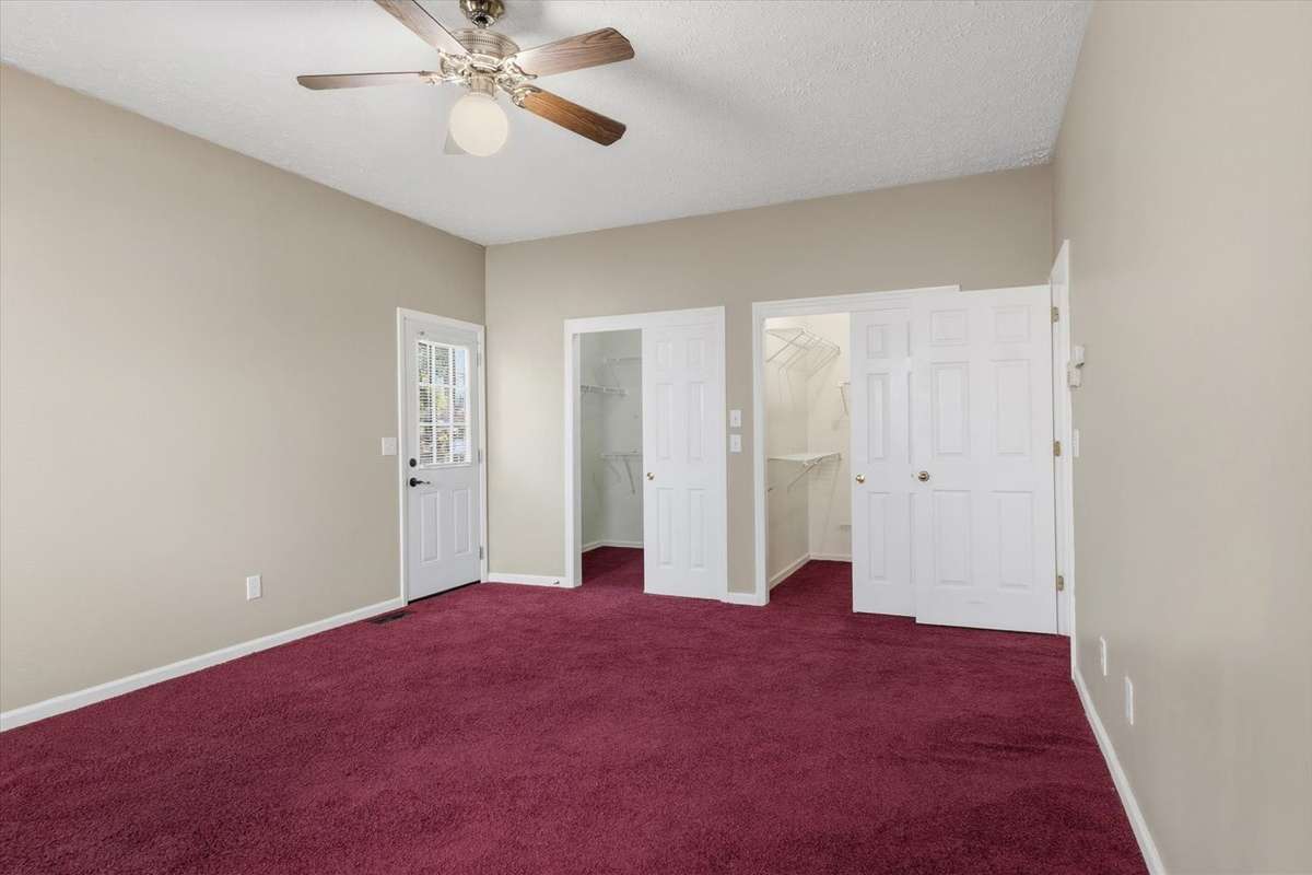 Secondary Primary downstairs with large walk-in double closets.
