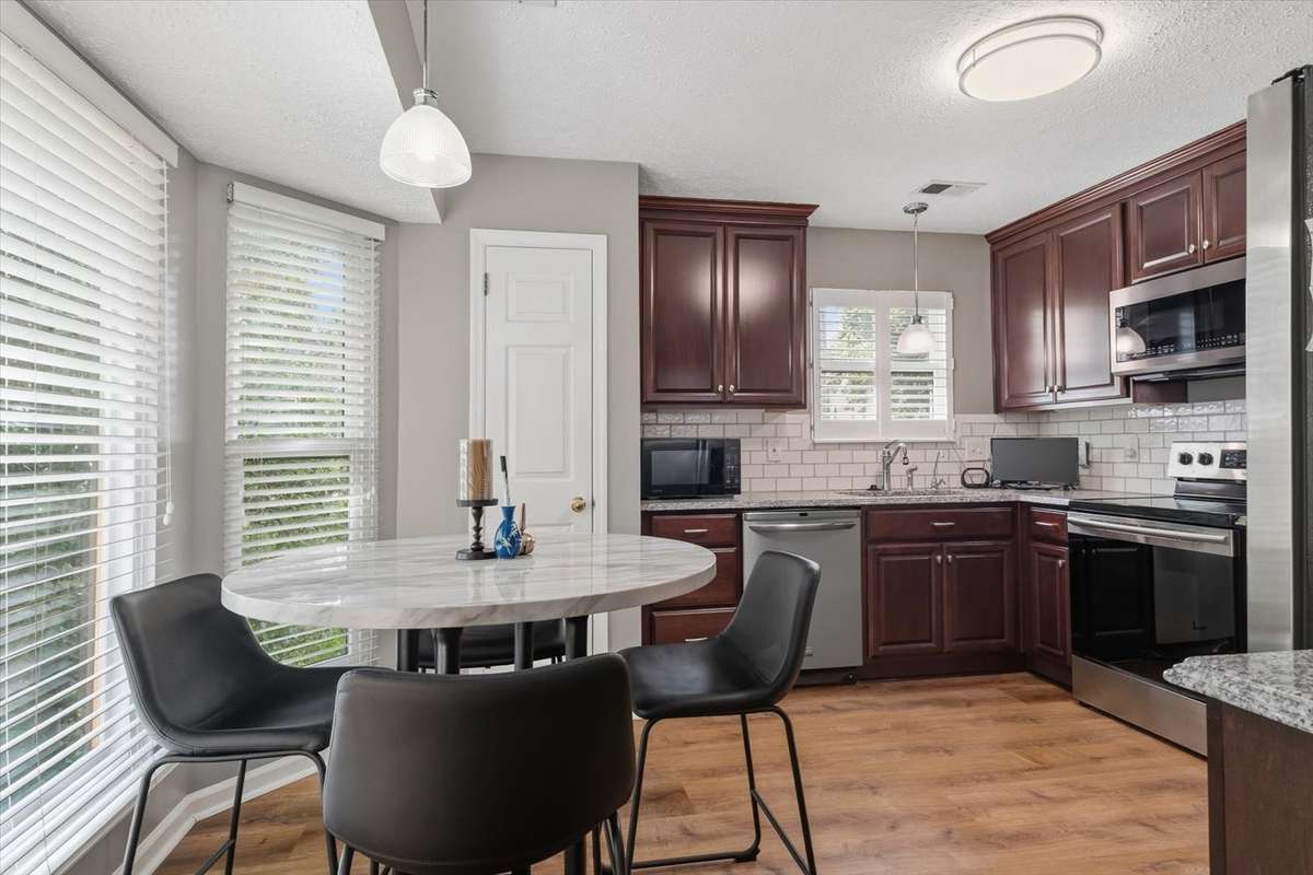 Kitchen within eat-in bay window noook.