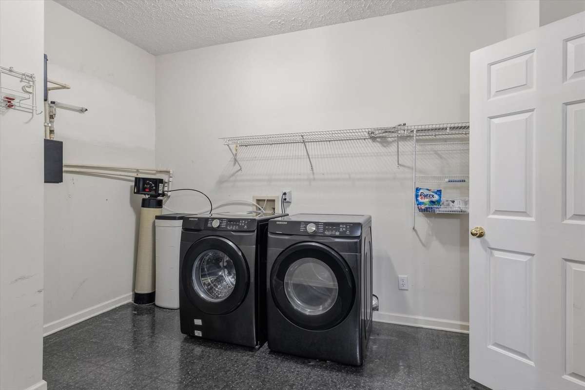 Whole home water filtration system and washer and dryer can convey. Lots of room for storage and hanging clothes.