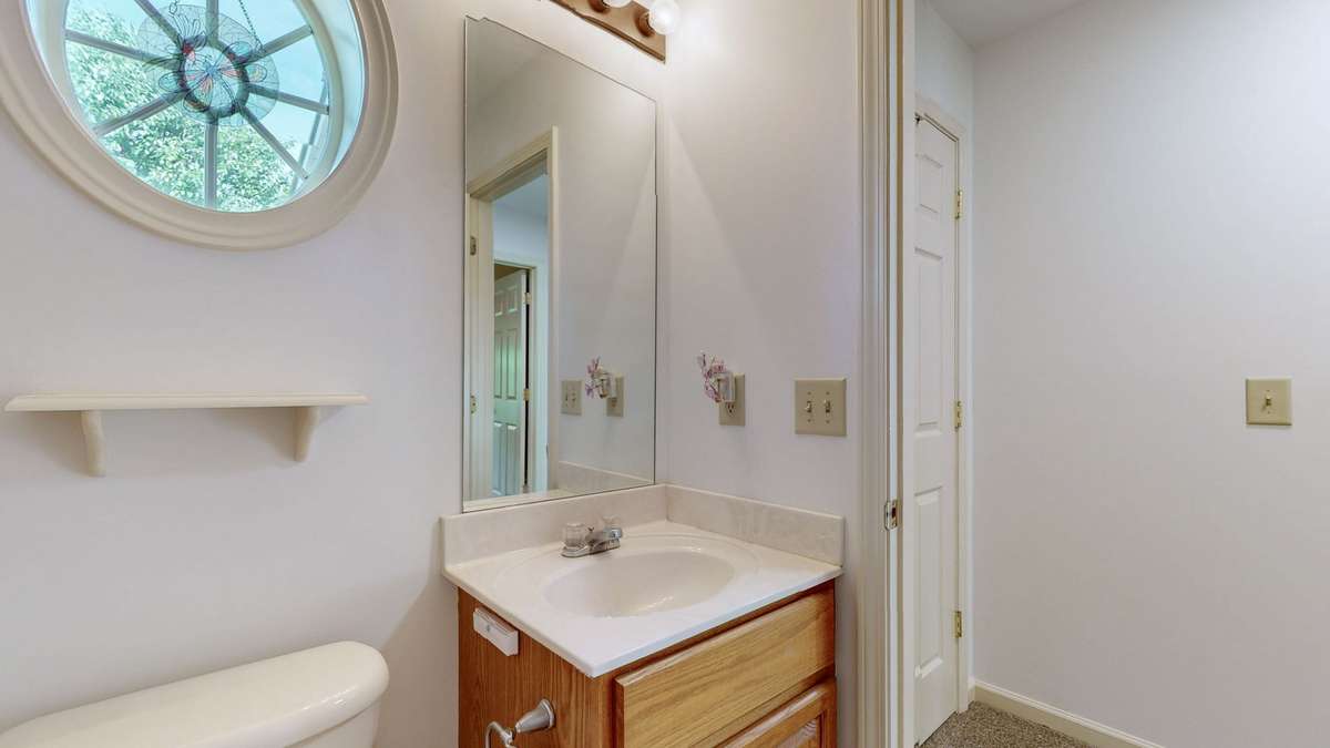 Main level FULL guest bath.  Tub/shower combo.