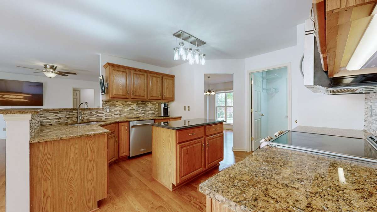 Beautiful solid oak cabinets with plenty of space.