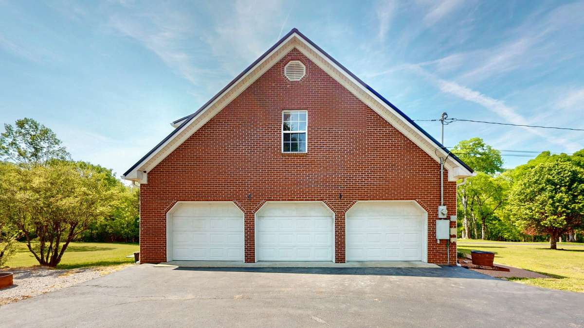 Three car side load garage.