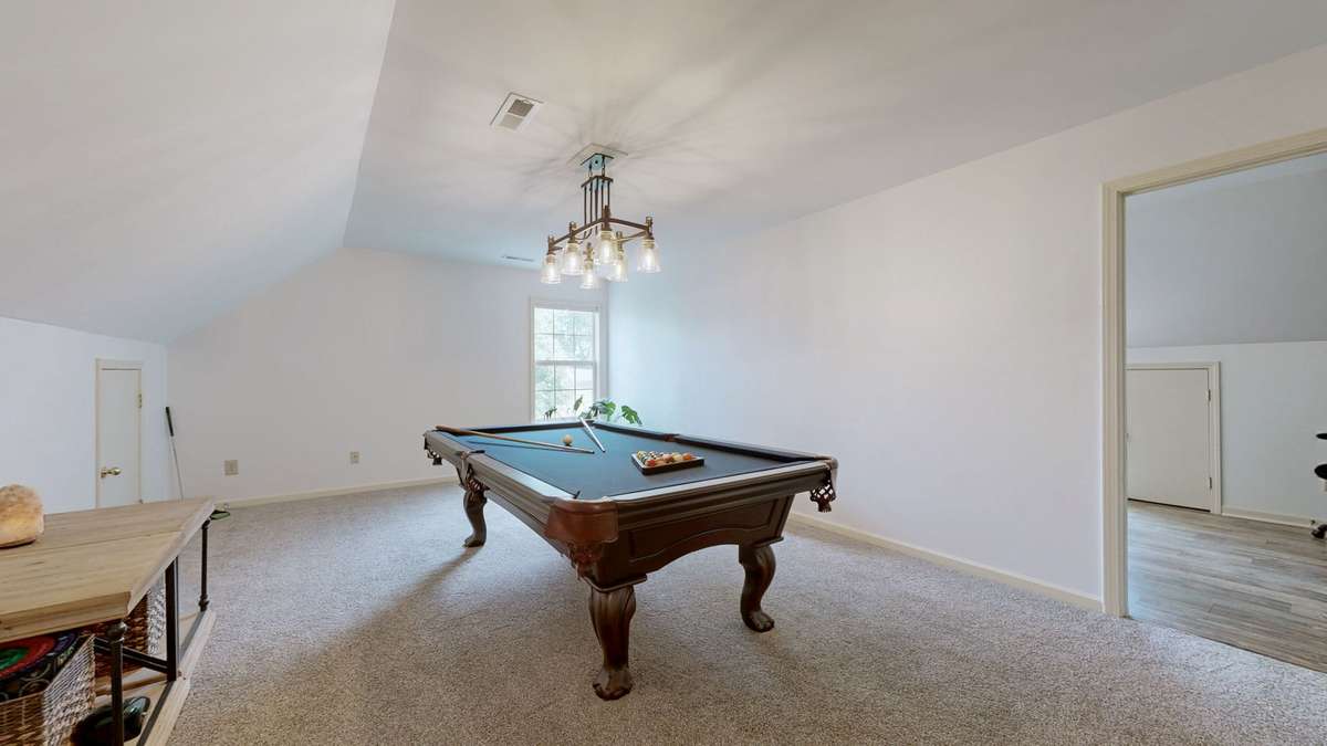 Bonus room comes with the pool table and equipment.