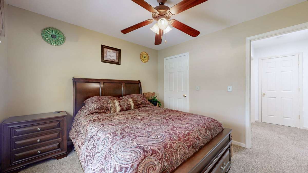 Main level guest bedroom.  GREAT FOR MULTI-GENERATIONAL HOUSEHOLDS!