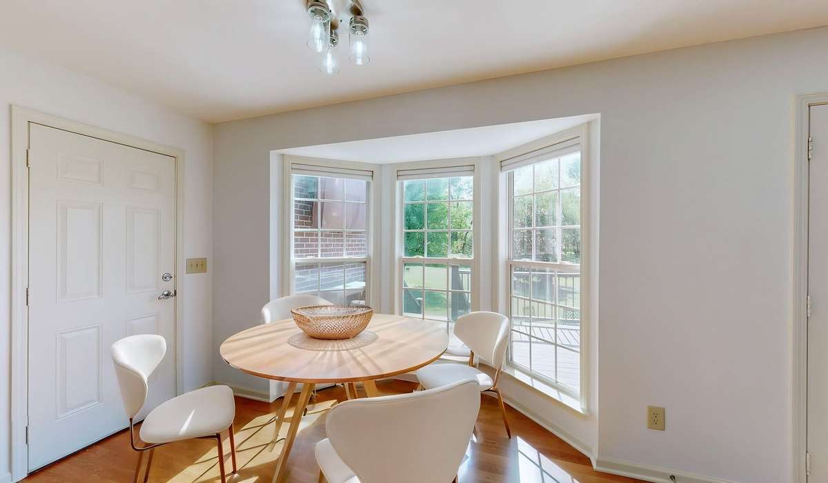 Bay window eat-in kitchen.  (virtually staged)