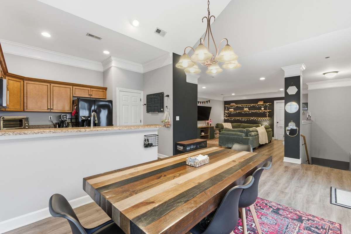 Floorplan is open without feeling like you're just in one giant room. Each space has it's own purpose. Creating this cozy feeling is hard to replicate in newly built townhomes in the area!