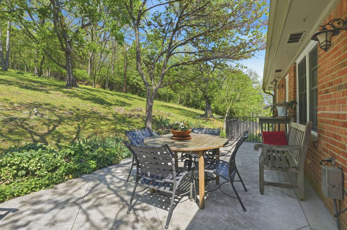 Back patio opens to backyard.