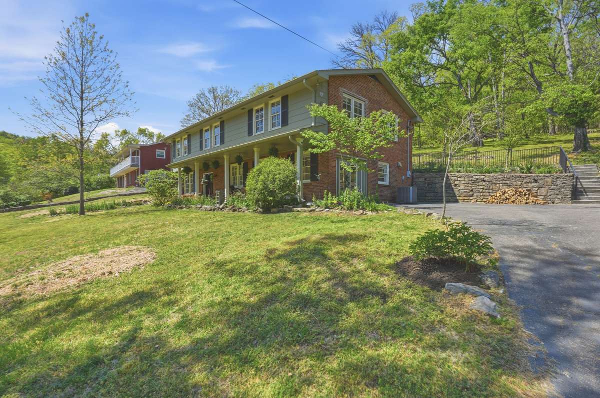 You will love this lot with mature trees surrounded by nature as soon as you pull up to the home.