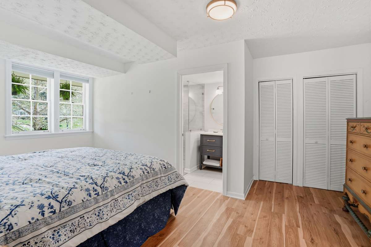 Light-filled bedroom (bedroom #3) with en-suite bath.