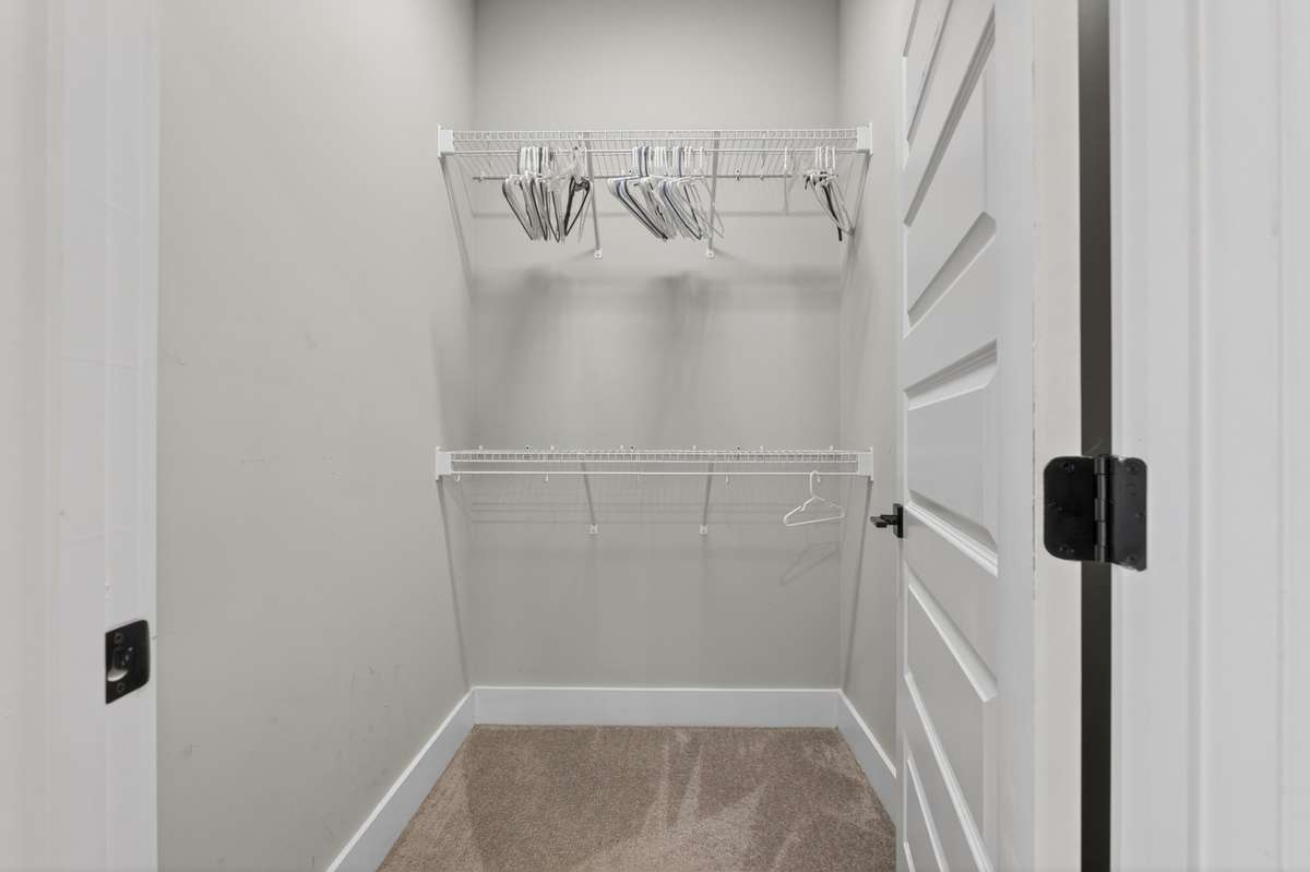 walk in closet in upstairs bedroom