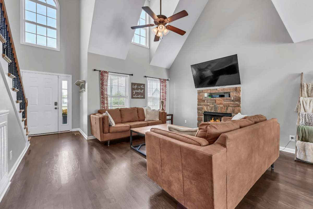 Spacious living room + plenty of natural light.