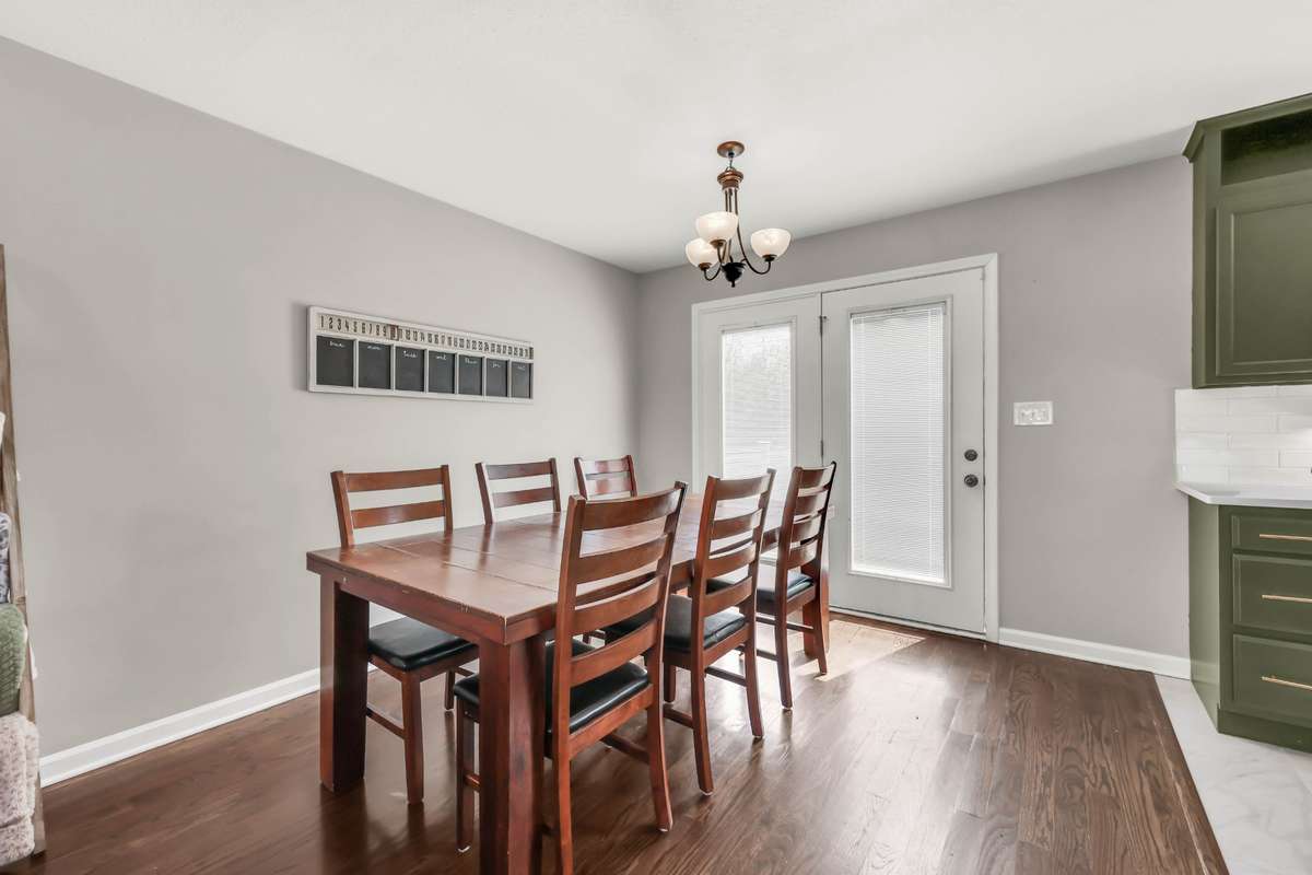 The dining room is conveniently located right off of the remodeled kitchen.