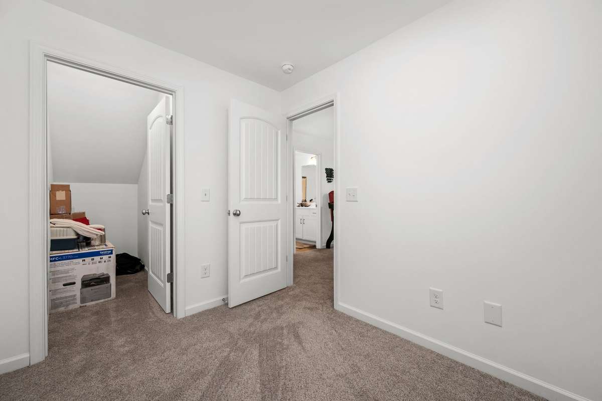 More walk-in storage off the lower flex room.