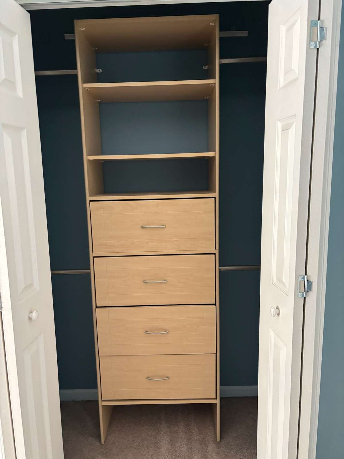 Closet in primary bedroom.