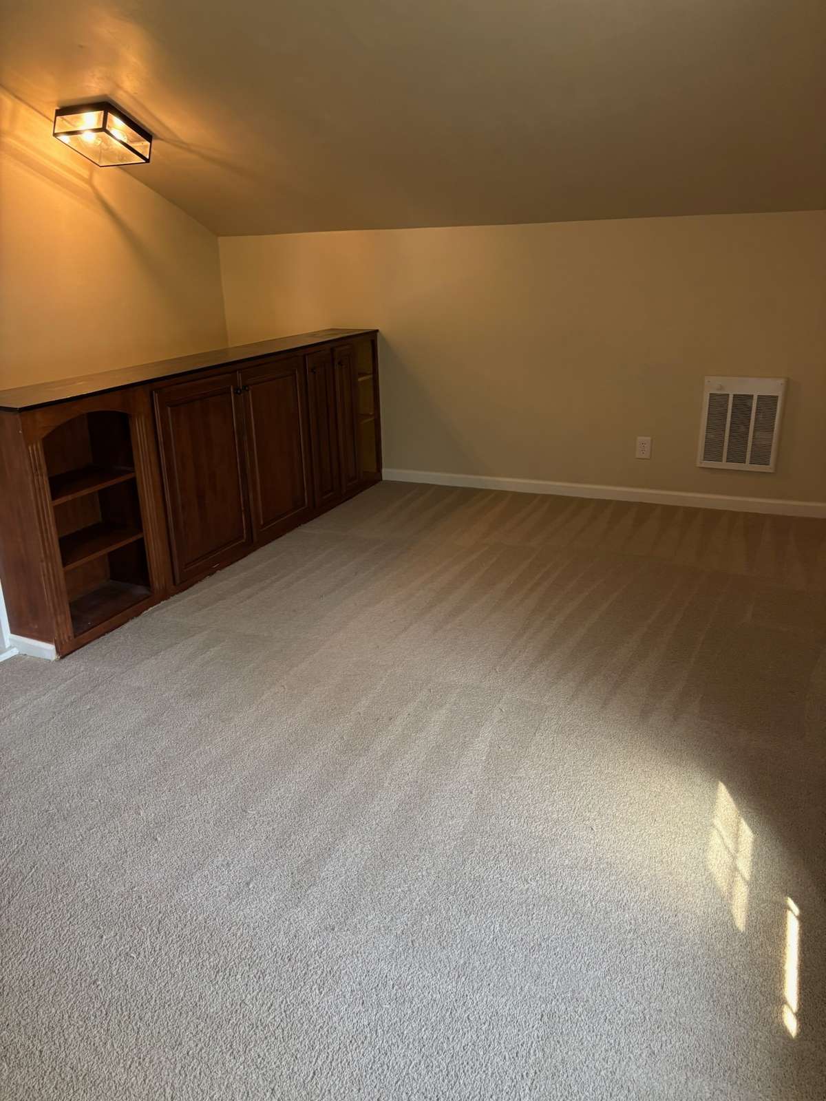 Bonus room with like new carpet and lots of storage.
