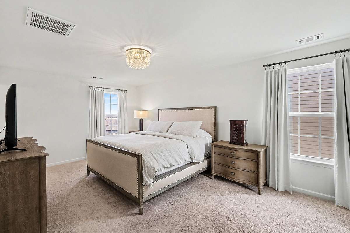 Spacious primary suite looks like a magazine