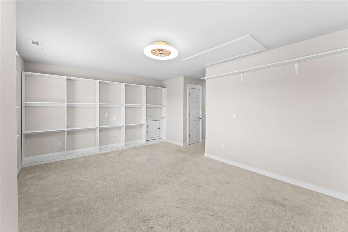 Bonus room/Man cave/Craft room with built in cabinets/storage