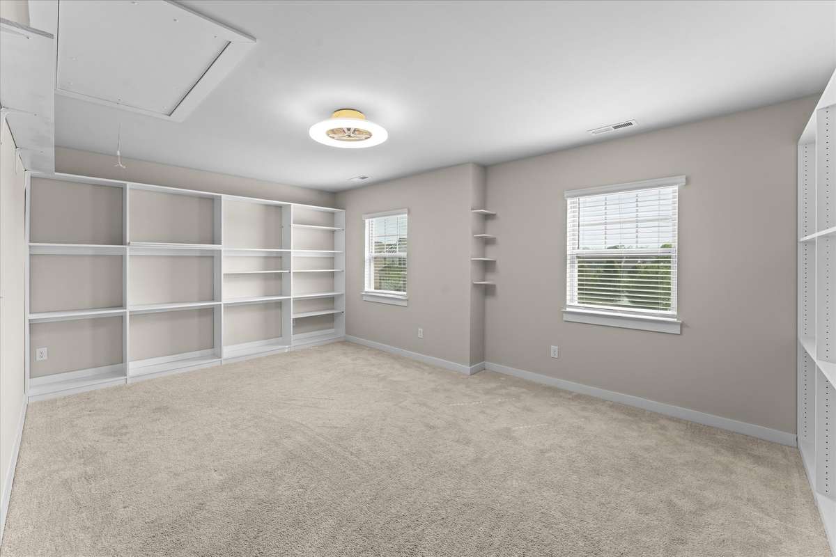 Bonus room/Man cave/Craft room with built in cabinets/storage