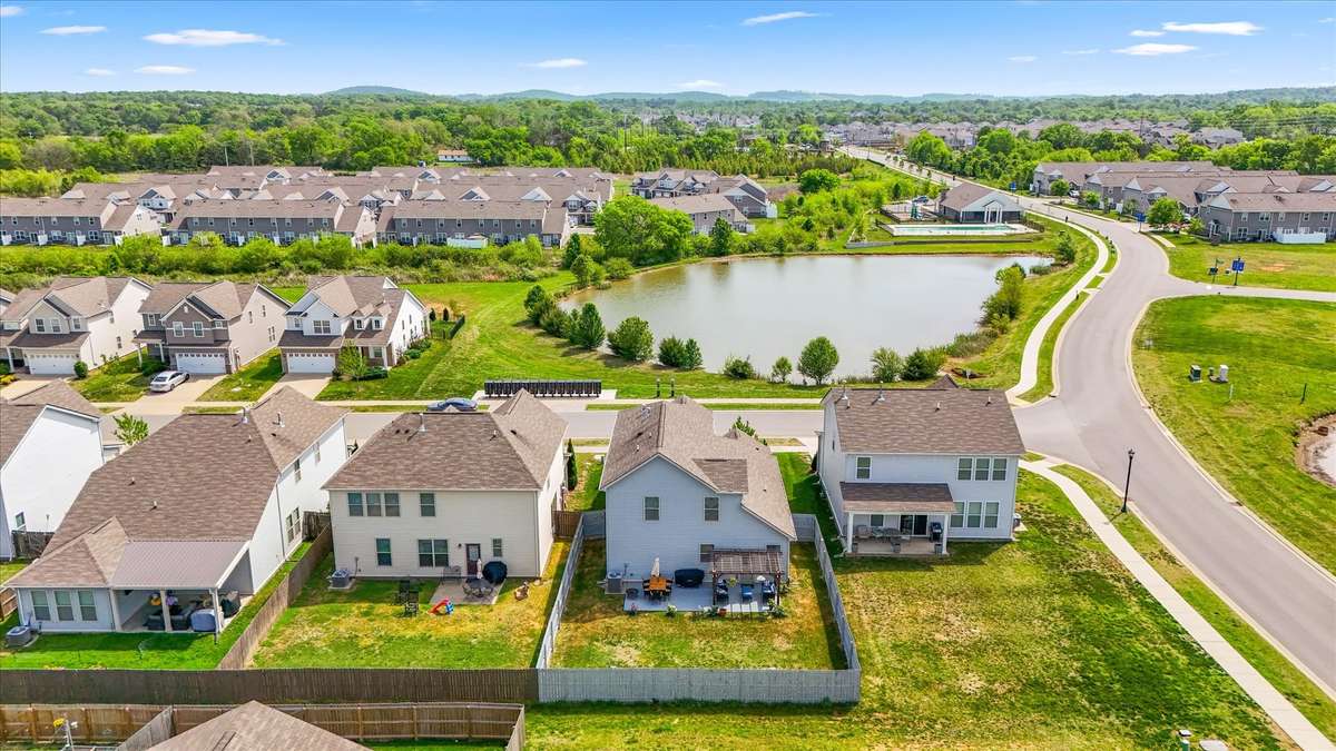 Home overlooks the lake and pool.