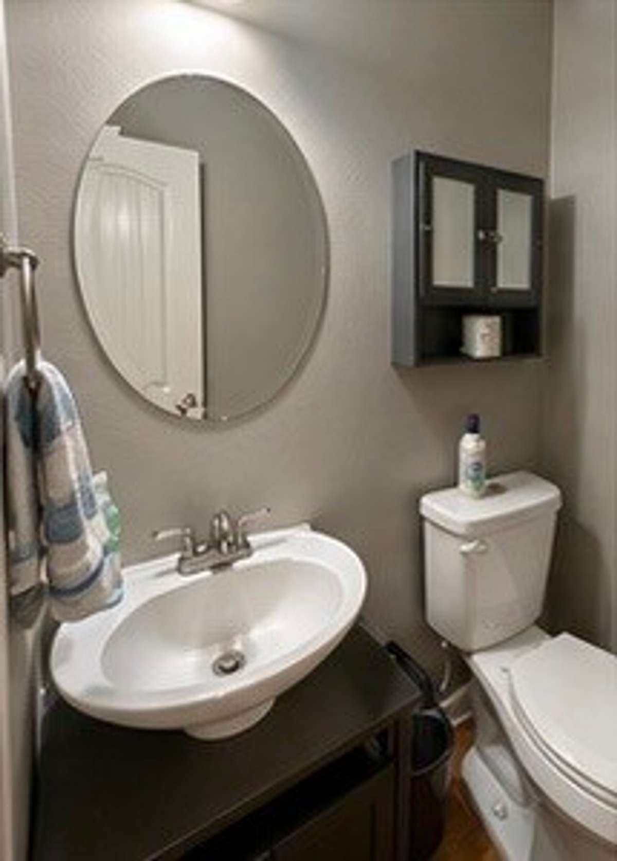 1/2 bath located just off kitchen