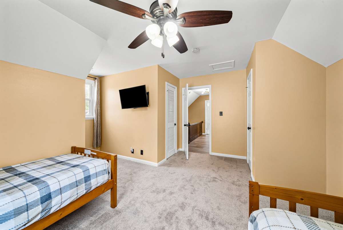 2nd View of 2nd Guest Room Ceiling Fan and Lots of walls for furniture