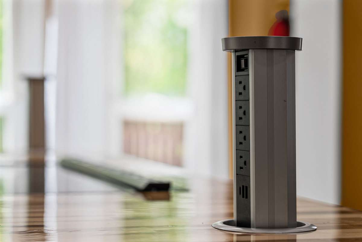 Check it Out....Pop Up Plug Ins on the kitchen island to make cooking and baking more convenient.